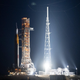 The SLS rocket sits on top of the launch pad at Kennedy Space Center.